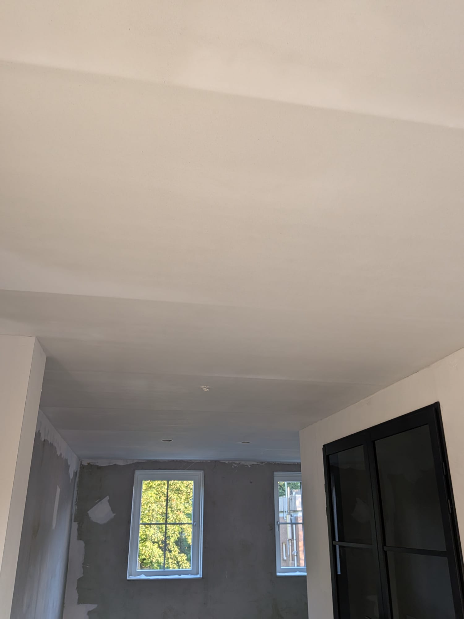 Nieuwbouw stucen: wanden met renovlies, plafonds stucen foto 3